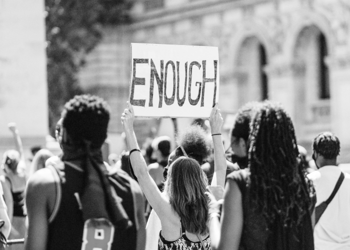 People protesting to end poverty in California by elevating the voices of people experiencing it.